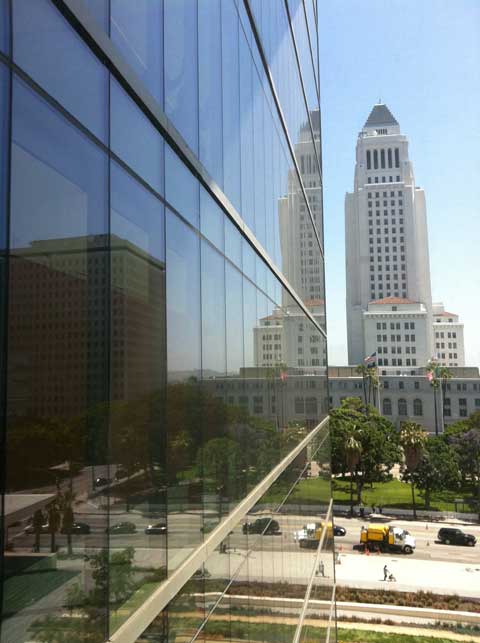 Excerpt from The Black Box
Bosch took a few steps around the room. He found an angle where the spire of city hall was doubled in the reflection of the glass skin of the PAB’s northern wing. City Hall (viewed from LAPD headquarters)