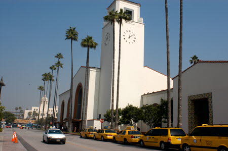 Excerpts From The Closers (Photo by Wendy Werris)
They crossed the street to the train station, its clock tower rising in front of the them.
Union Station was designed to mirror the city it served and the way in which it was supposed to work. It was a melting pot of architectural styles—Spanish Colonial, Mission, Streamline Moderne, Art Deco, Southwestern and Moorish design flourishes among them. But unlike the rest of the city where the pot more often than not boiled over, the styles at the train station blended smoothly into something unique, something beautiful. Bosch loved it for that. Union Station Clock Tower