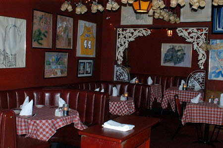 Excerpt From The Brass Verdict (Photo by Wendy Werris)
"It's eight-thirty. I think you should go home."
"I think I should too, I'm going to wait to hear back from Cisco--he's checking something out for me--and then I think I'm going over to Dan Tana's to have steak and spaghetti."
She knew I went to Dan Tana's when I had something to celebrate. Usually a good verdict.
<p style="text-align:center;"> - - - - -</p>
I went in by myself and Craig sat me in one of the cherished corner booths. It was a busy night but things were tapering off. I saw the actor James Woods finishing dinner in a booth with a movie producer named Mace Neufeld. They were regulars and Mace gave me a nod. He had once tried to option one of my cases for a film but it didn't work out. In another booth I saw Corbin Bernsen, the actor who had given the best approximation of an attorney on television I had ever seen. And then in another booth, the man himself, Dan Tana, was having a late dinner with his wife. I dropped my eyes to the checkered tablecloth. Enough who's who. I had to prepare for Bosch. Dan Tana's