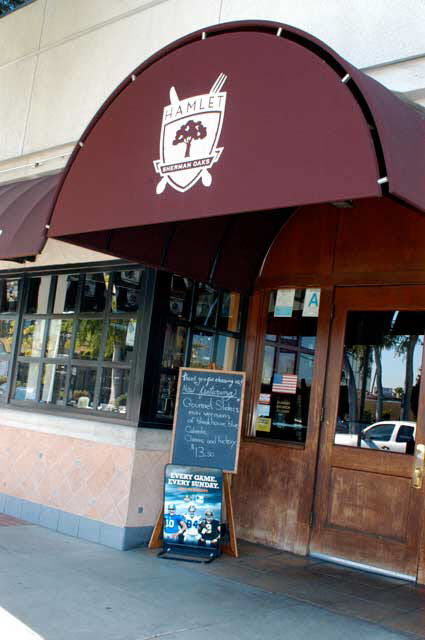 Excerpt from The Fifth Witness
(Photo by Wendy Werris)
I had Rojas pick us up and we went down Van Nuys to the Hamlet near Ventura. The place had been there for decades and while it had classed itself up since the days it was called Hamburger Hamlet, the food was just the same. Because the judge had gotten us out early, we avoided the noon lineup and were immediately shown to a booth. The Hamlet