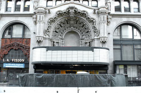 Excerpt From The Overlook (Photo by Wendy Werris)
The Million Dollar Theater was built in a time when the movie business showed itself off in magnificent theater palaces that lined Broadway in downtown. But it had been decades since a first run film had been projected on a screen there. Its ornate façade had been covered by a lighted marquee that for a time announced religious revivals instead of movies. Now the theater waited unused for renovation and redemption while above it a once grand office building was twelve stories of mid-grade office space and residential lofts. The Million Dollar Theater