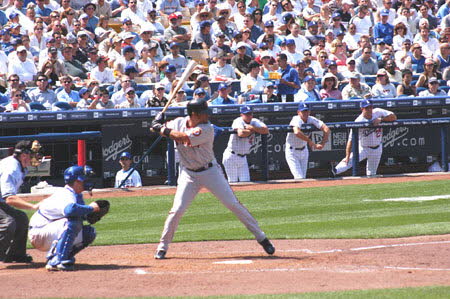 Excerpt From The Lincoln Lawyer (Photo by Wendy Werris)
Having given Earl the day off with pay, I drove myself toward downtown and Dodger Stadium. Traffic was light until I got close. The home opener is always a sell out, even though it is a day game on a weekday. The start of baseball season is a right of spring that draws downtown workers by the thousands. It's the only sporting event in laid back L.A. where you see men in stiff white shirts and ties. They're all playing hooky. There is nothing like the start of a season, before all the one-run losses, pitching break downs and missed opportunities. Before reality sets in.
I was the first one to the seats. We were three rows from the field in seats added to the stadium during the off season. Levin must have busted a nut buying the tickets from one of the local brokers. At least it was deductible as a business entertainment expense. Opening Day at Dodger Stadium