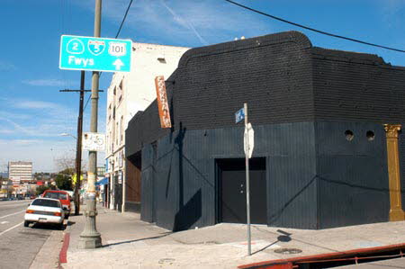 Excerpt From The Scarecrow (Photo by Wendy Werris)
The Short Stop was on Sunset in Echo Park. That made it close to Dodger Stadium, so presumably it drew its name from the baseball position. It was also close to the Los Angeles Police Academy and that made it a cop bar in its early years. It was the kind of place you'd read about in Joseph Wambaugh novels, where cops came to be with their own kind and the groupies who didn't judge them. But those days were long past. Echo Park was changing. It was getting Hollywood hip and the cops were crowded out of the Short Stop by the young professionals moving into the neighborhood. The prices went up and the cops found other watering holes. Police paraphernalia still hung on the walls but any cop who stopped in nowadays was simply misinformed.
Still, I liked the place because it was close to downtown and on the way to my house in Hollywood. The Short Stop Bar