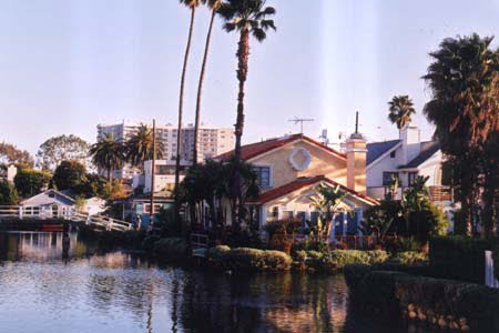 Excerpt From City Of Bones (Photo by Wendy Werris)
Not all of the dreamers drawn to Los Angeles came to make movies. Venice was the century-old dream of a man named Abbot Kinney. Before Hollywood and the film industry barely had a pulse, Kinney came to the marshlands along the Pacific. He envisioned a place built on a network of canals with arched bridges and a town center of Italian architecture. It would be a place emphasizing cultural and artistic learning. And he would call it Venice of America.
But like most of the dreamers who come to Los Angeles his vision was not uniformly shared or realized. Most financiers and investigators were cynical and passed on the opportunity to build Venice, putting their money into projects of less grand design. Venice of America was dubbed "Kinney's Folly."
But a century later many of the canals and the arched bridges reflected in their waters remained while the financiers and doomsayers and their projects were long swept away by time. Bosch liked the idea of Kinney's Folly outlasting them all. Venice of America